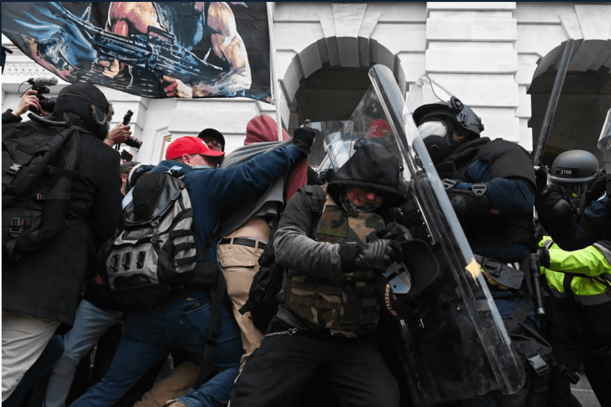 January 6 rioters assault police