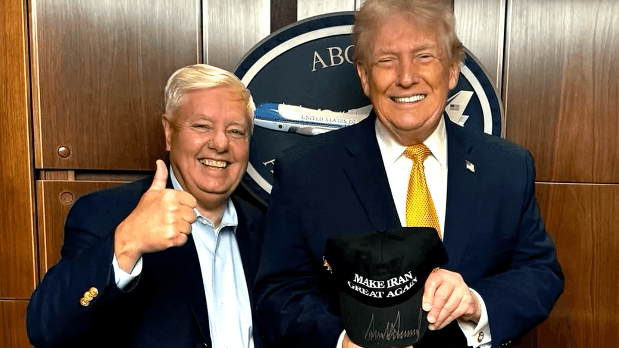 Lindsey Graham and Donald Trump with make iran great again cap