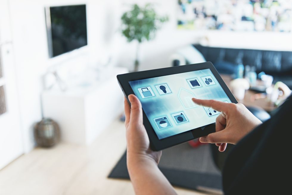 a photo of a tablet showing home security system.