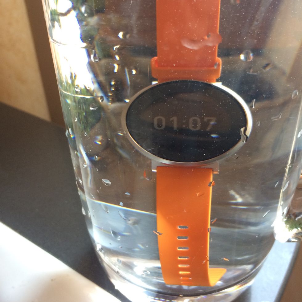 Huawei Fit in a glass of water
