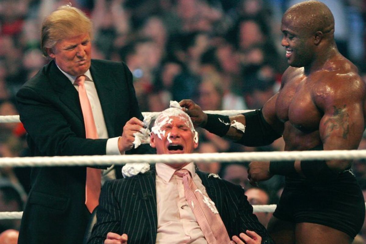 Trump shaves McMahon's head.