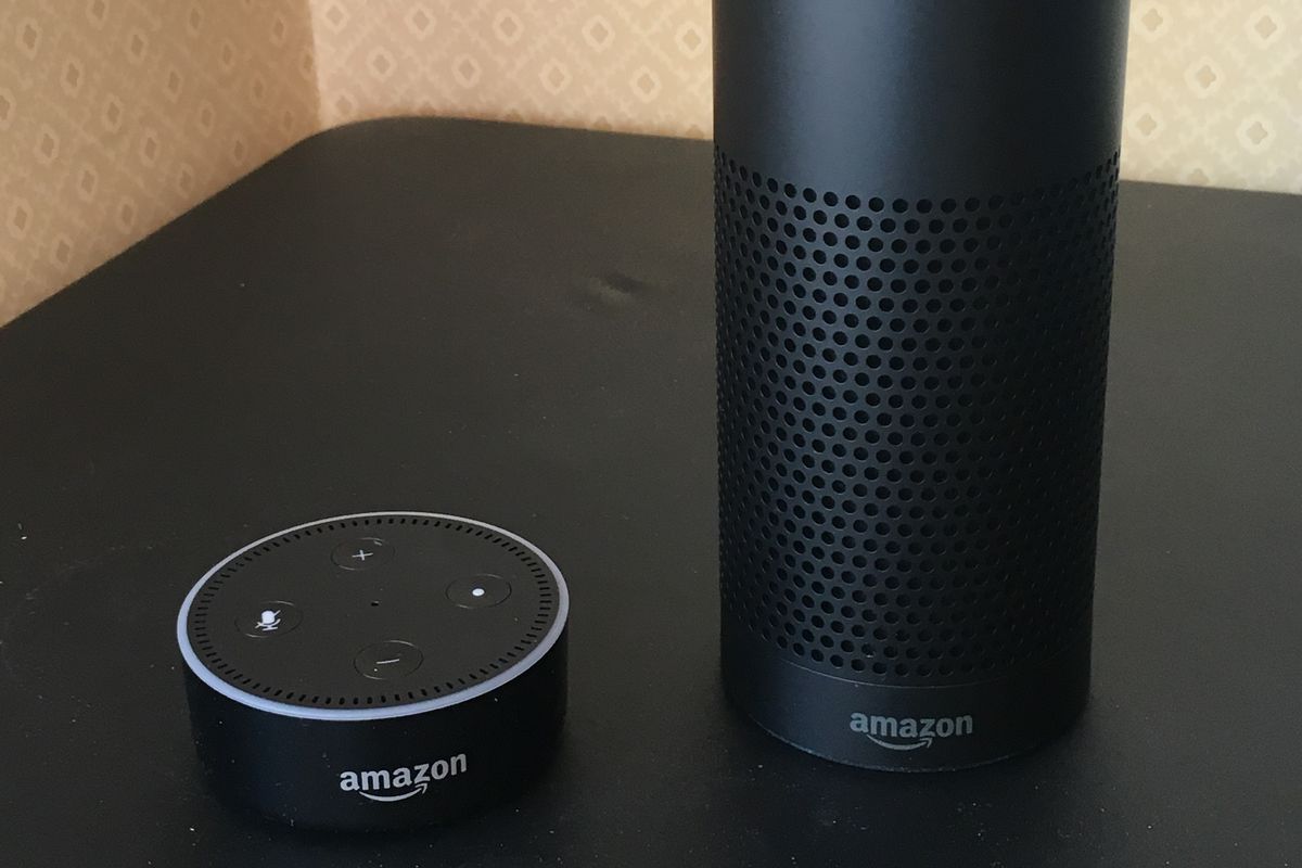 a photo of Amazon Echo Dot and Echo speaker 1st gen