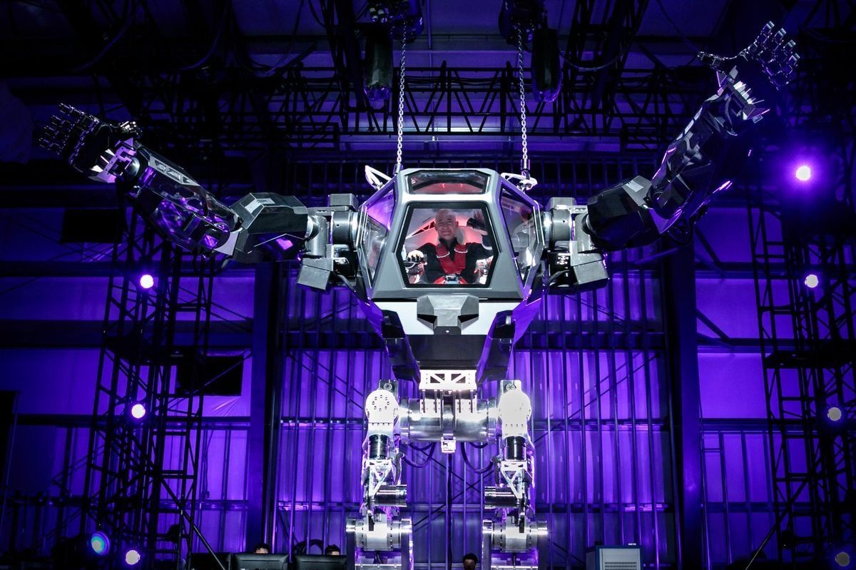 Amazon's Jeff Bezos pilots giant robot