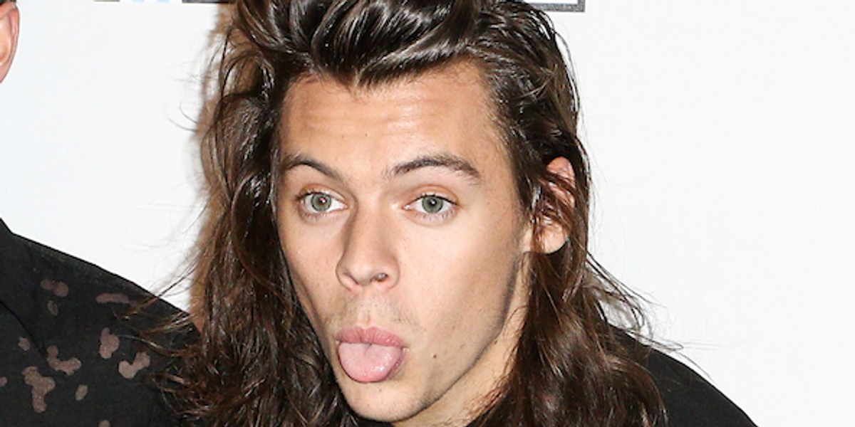 The Internet is Losing it Over these Photos of Harry Styles Dangling from a Helicopter