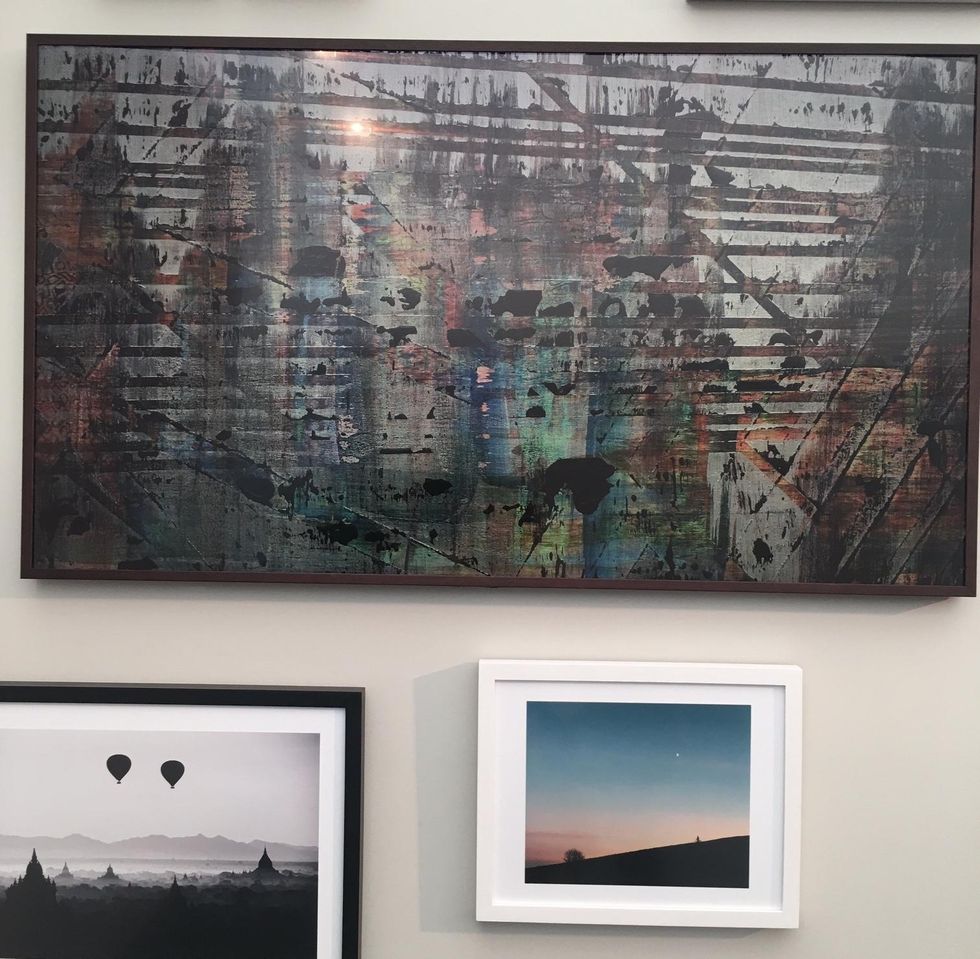 a photo or painting on a wall with Samsung Frame TV