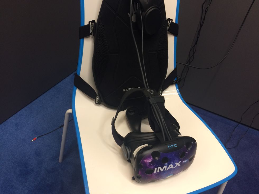 a photo of HTC iMAX VR Headset and chair by HTC