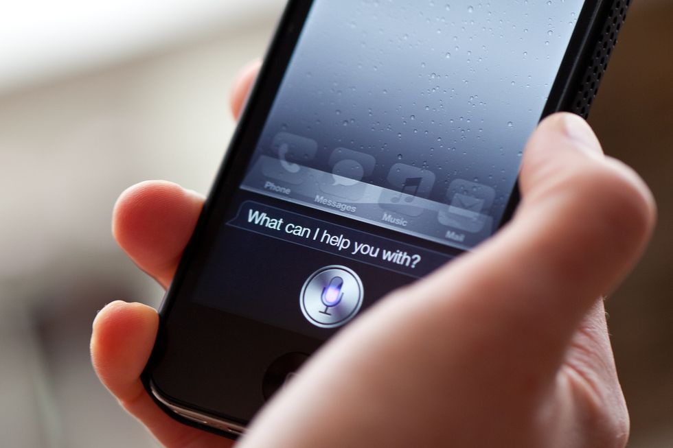 photo of a smartphone and texting with phone assistant.