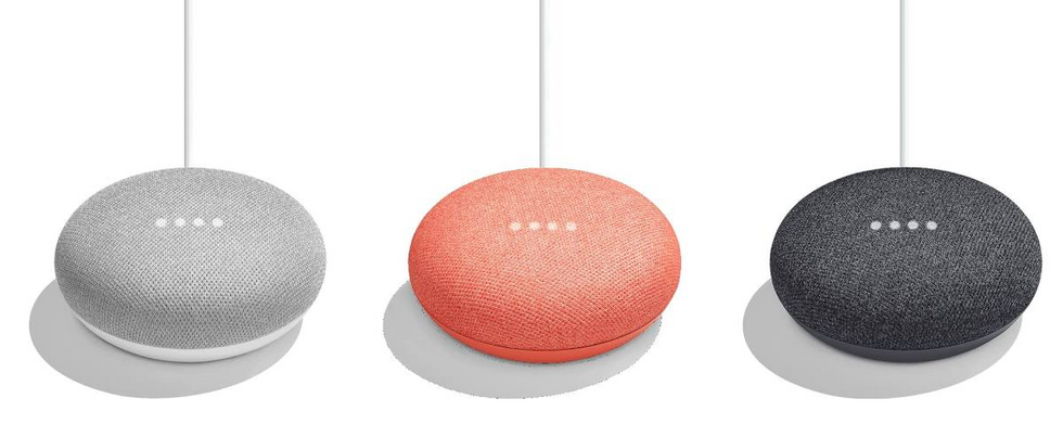 Picture of three Google Home Mini's in a row.