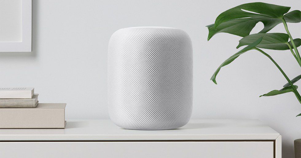 photo of Apple HomePod 1st Gen on a table.