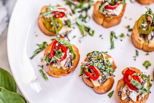 Canned Sardines Crostini with Sherry Pickled Chiles + Herbs