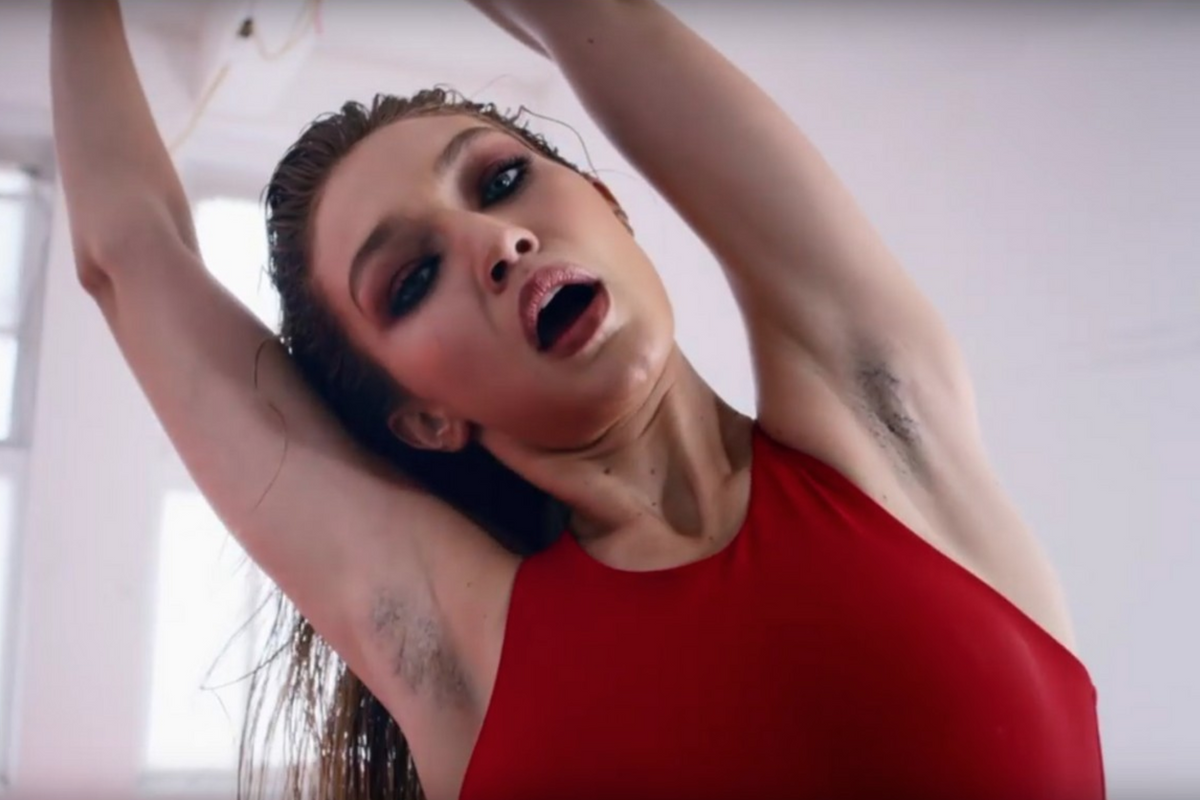 Gigi Hadid Ignites Internet with Coat Fluff 'Armpit Hair' in Sexy Video -  PAPER