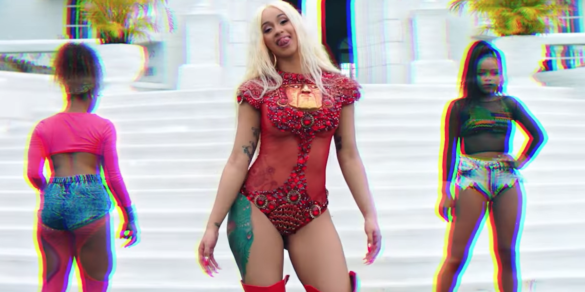 Cardi B & Ozuna Saunter Down to Jamaica for New 'La Modelo' Video