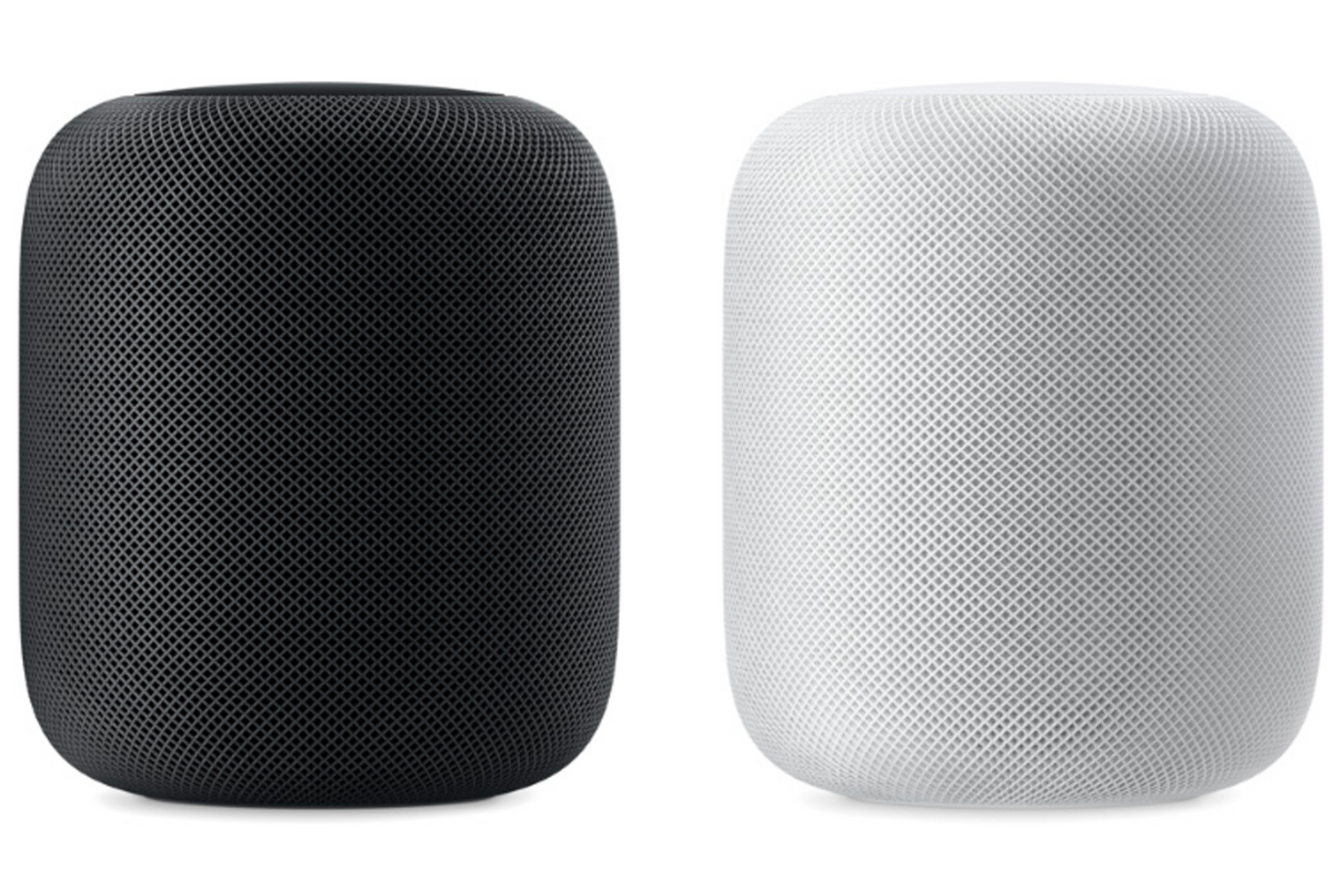 a photo of a black and white Apple HomePods