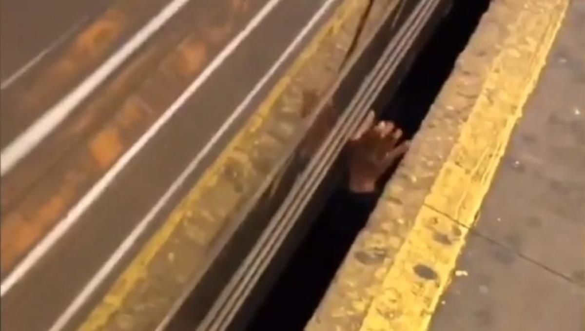 Drunk Man Spotted Smoking Cigarette Underneath NYC Subway Train, Proceeds to Dance Away on Platform