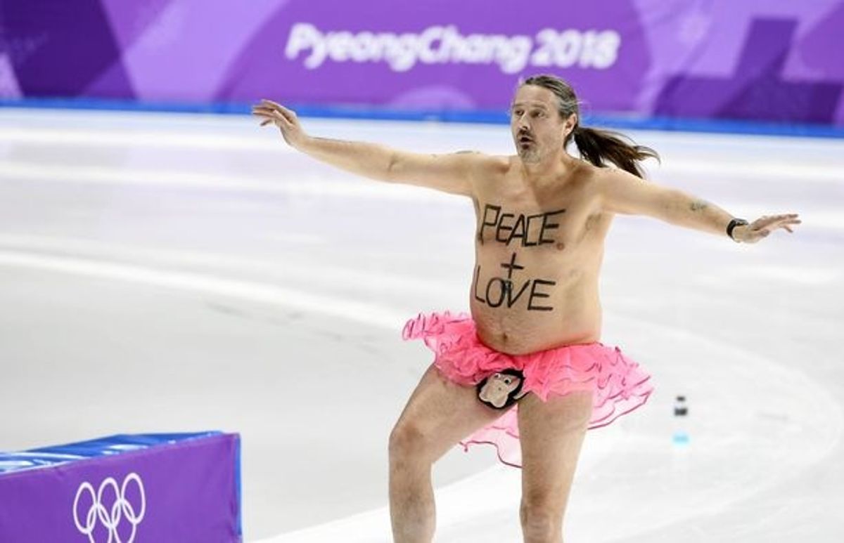 Professional Streaker in Pink Tutu Crashes Olympic Games With Message of 'Peace & Love'