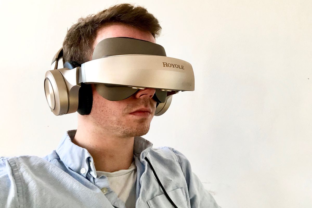 a photo of a man wearing a Royole Moon Headset