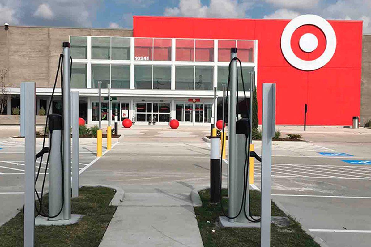 A photo of a Target parking lot with electric car charging stations