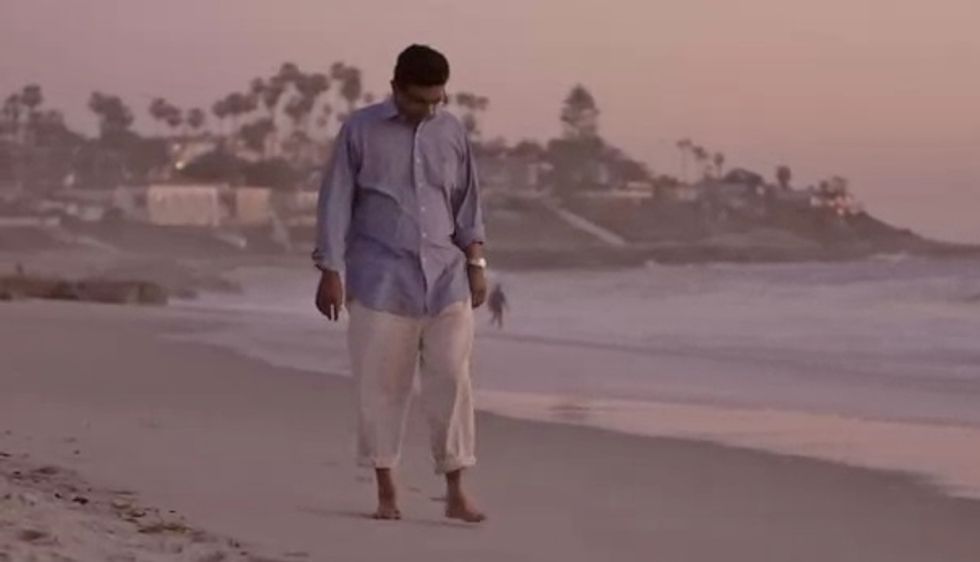 Let's All Watch Convicted Felon Dinesh D'Souza Whine About His Martyrdom While Strolling The Beach