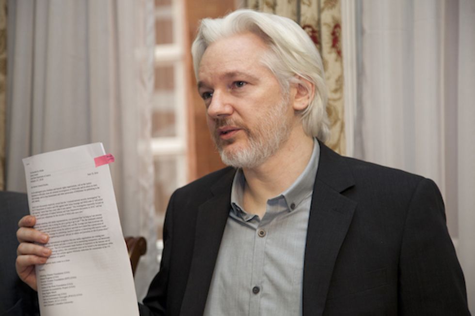 Julian Assange Shows True Colors, It Is This White Hood