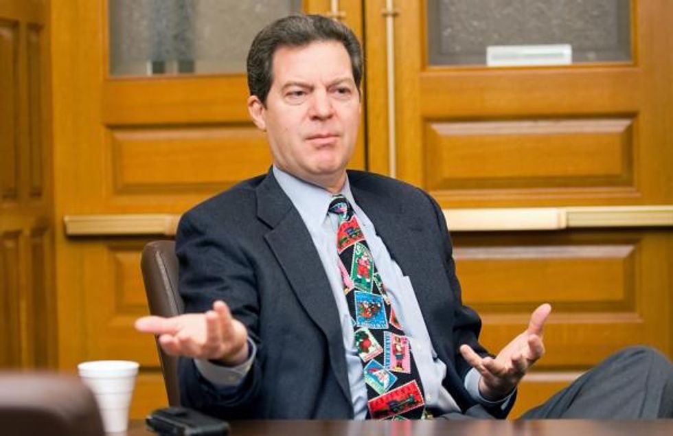 Sam Brownback Is Playing You With His Shiny Gleaming Anti-Gay Bullsh*t (Again)