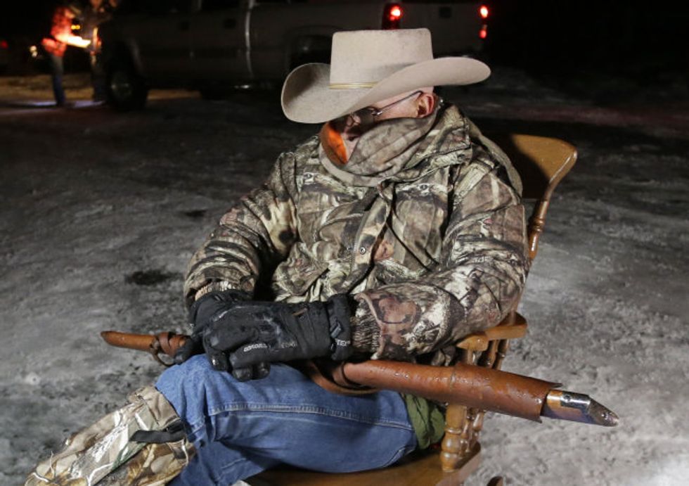 Sundays With The Militia: In 'Tarp Man's' Novel, Guns Are The Most Interesting Characters