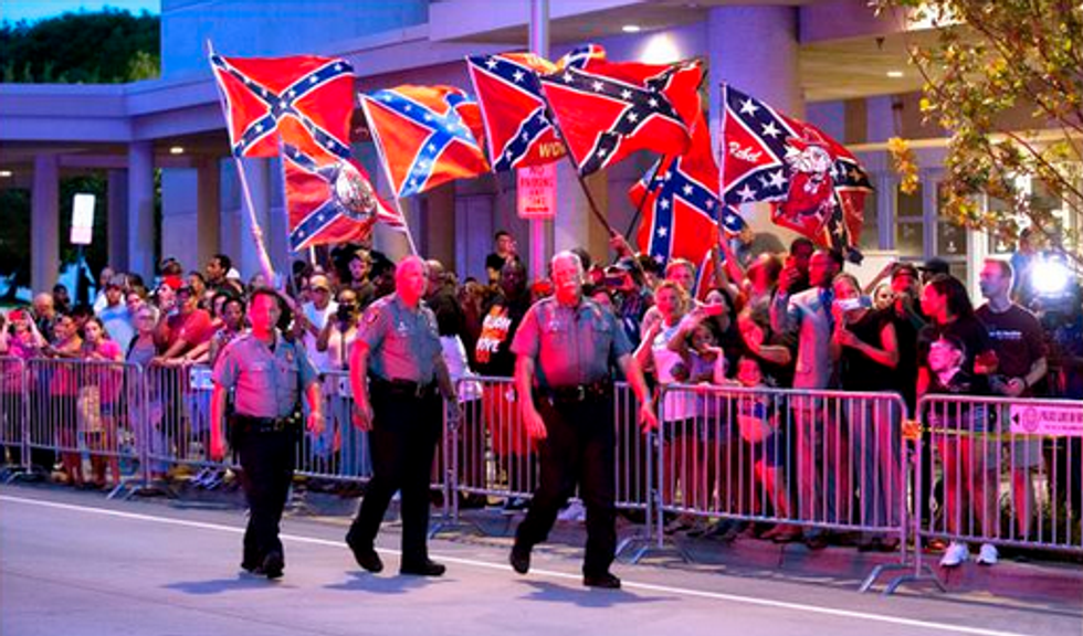 Dumb Okie Hicks Greet 'President' Obama With Treason Flag, Love