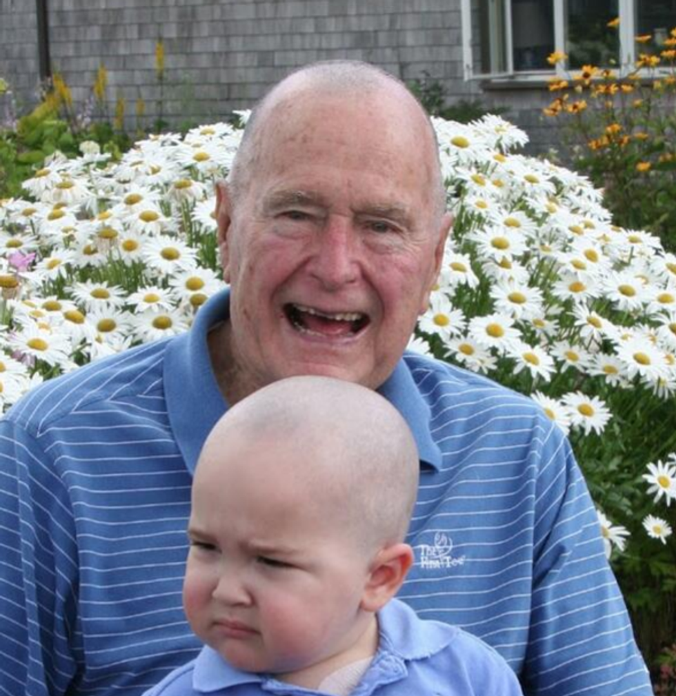 Bipartisan Nice Time: Here Is Bald George H.W. Bush, Holding This Bad-Ass Baby With Cancer