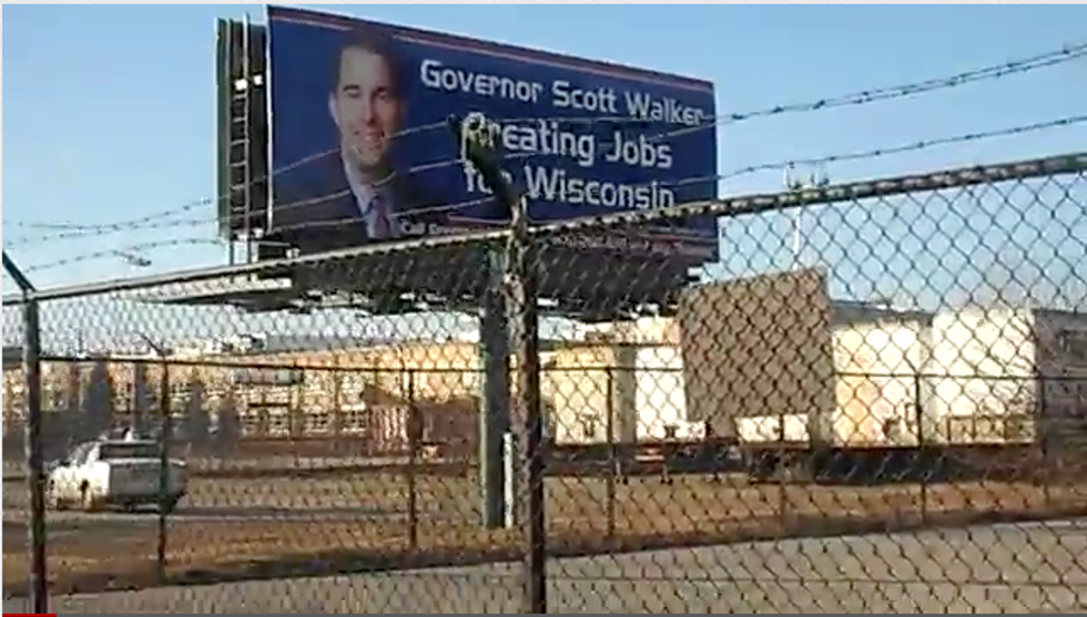 Scott Walker Billboard Brags About Job Creation To Empty Factory Yard