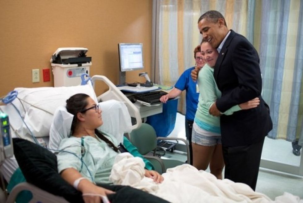 Wingnuts Furious: Obama Hugged A White Gal