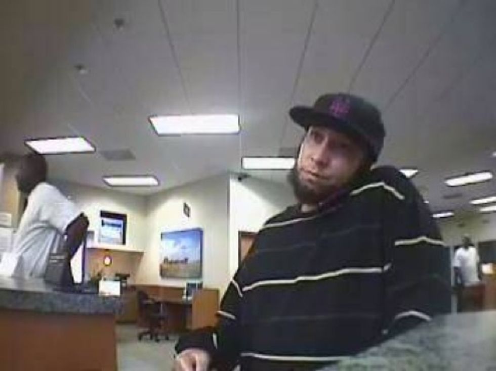 Is This Schlubby Bank Robber The Ghost of Abraham Lincoln?
