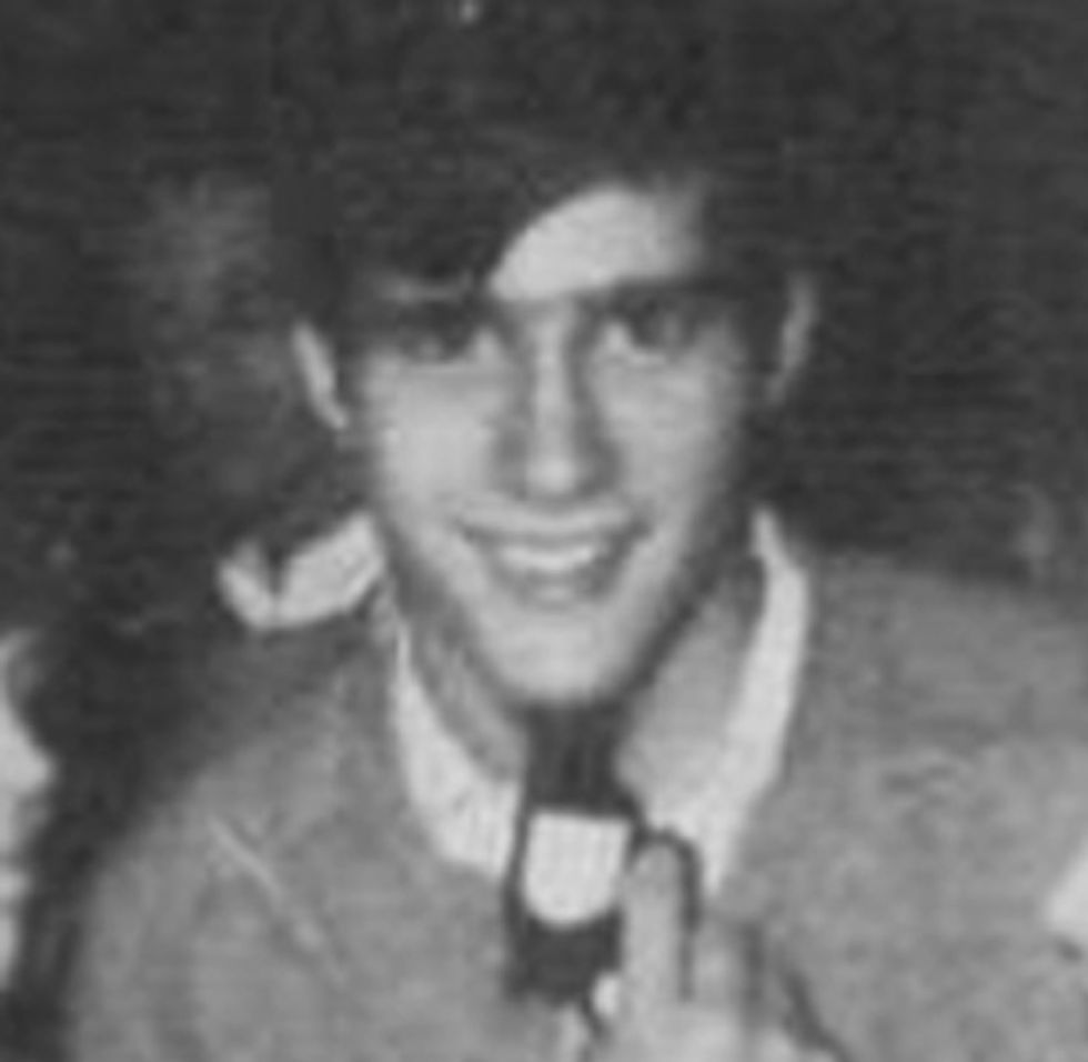 And Here Is A Youthful, Smiling Mitt Romney Pointing A Gun At His Jaw