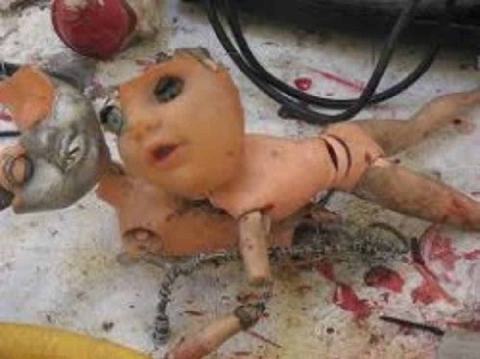 Barack Obama Chopping Up Aborted Babies for Fun and Profit