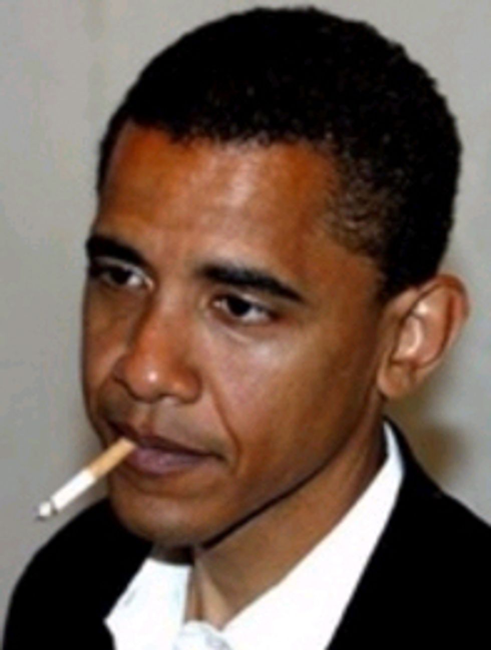 Barack Obama Back To Smoking His Face Off