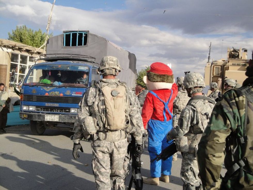 Dave Petraeus Reinvades Afghanistan With 'Multinational' NATO Surge