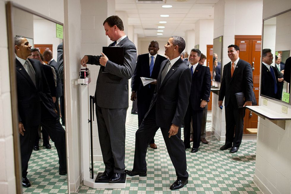 Socialist Practical Joker Puts Thumb (Foot) On Scale of Capitalism (Scale of People's Weight)