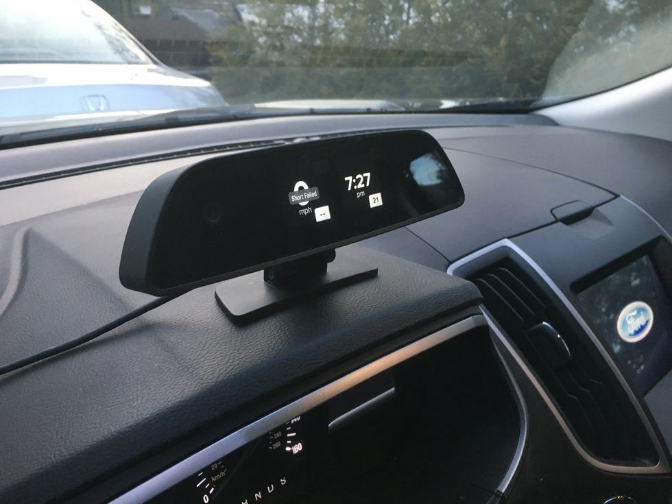Raven, pictured here, fits on the car's dashboard and acts as a security camera while keeping track of how the vehicle is doing on the road.