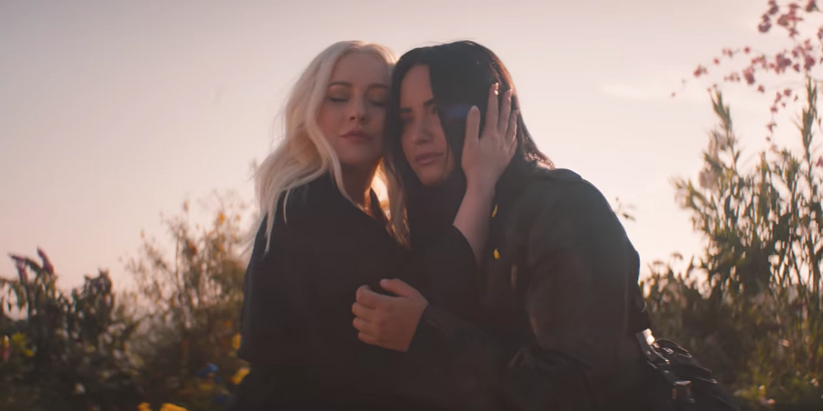 Christina Aguilera and Demi Lovato Fight the System For 'Fall In Line'