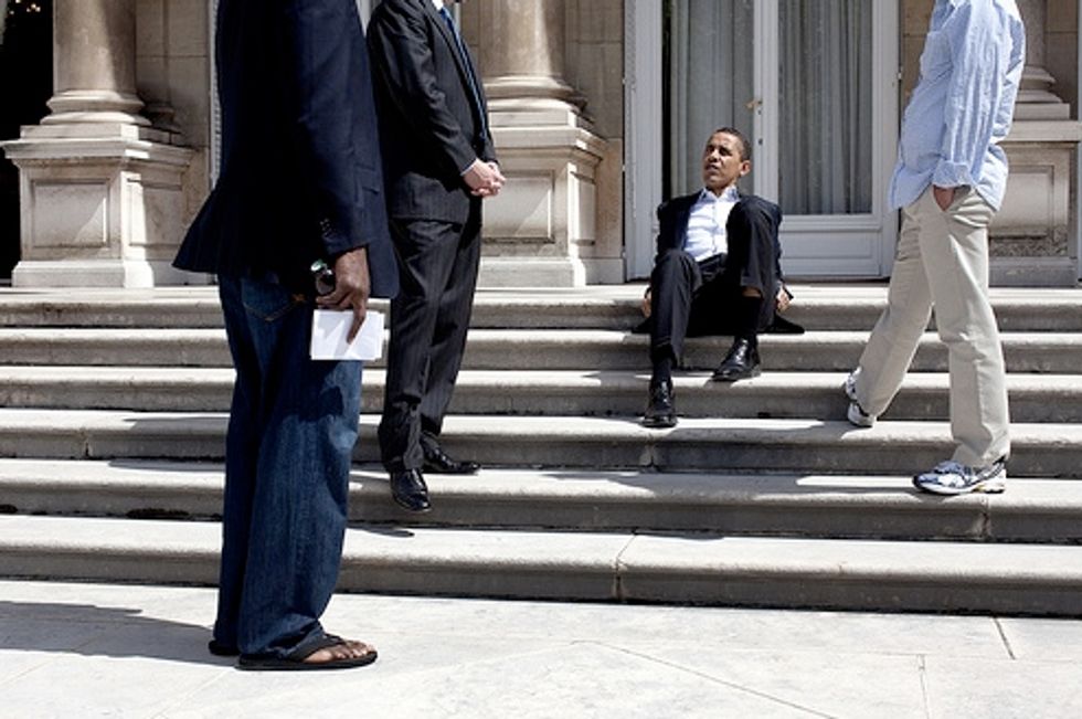 Hey It's Barack Obama Sitting On Some Stairs