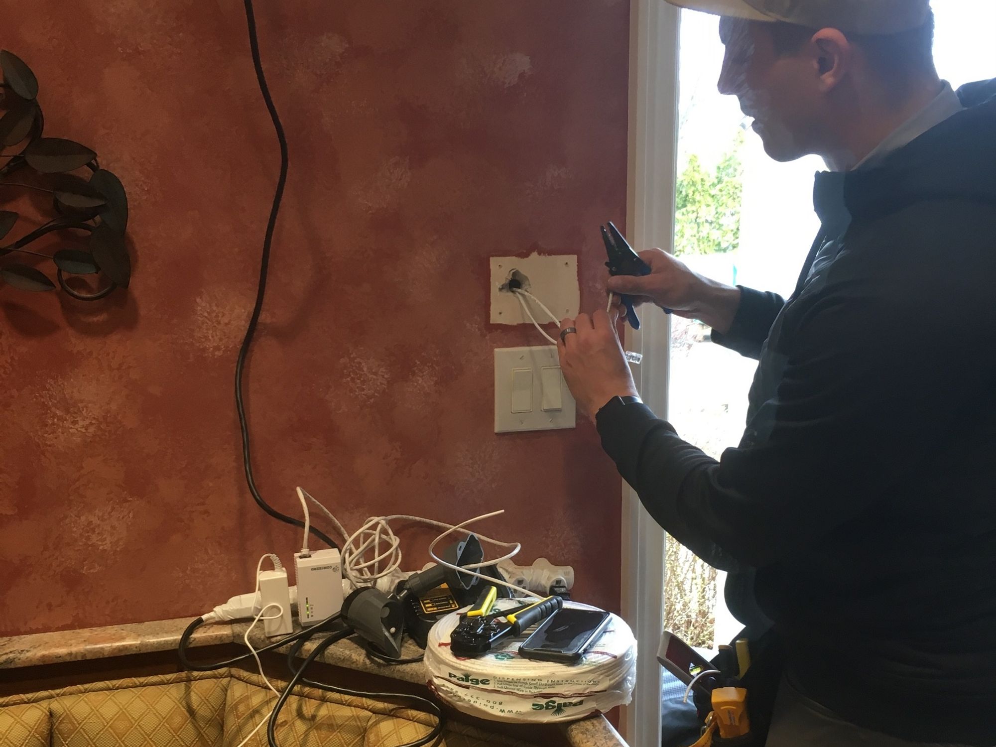 Vivint Installer installing Vivint Smart Hub.