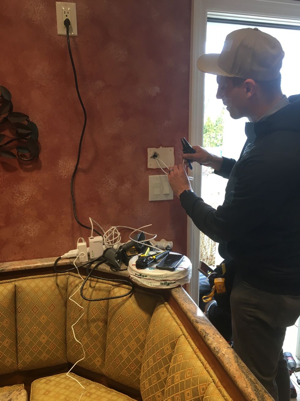 Vivint Installer installing Vivint Smart Hub.