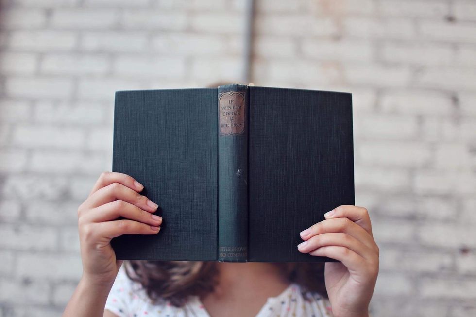 https://www.pexels.com/photo/blur-book-girl-hands-373465/