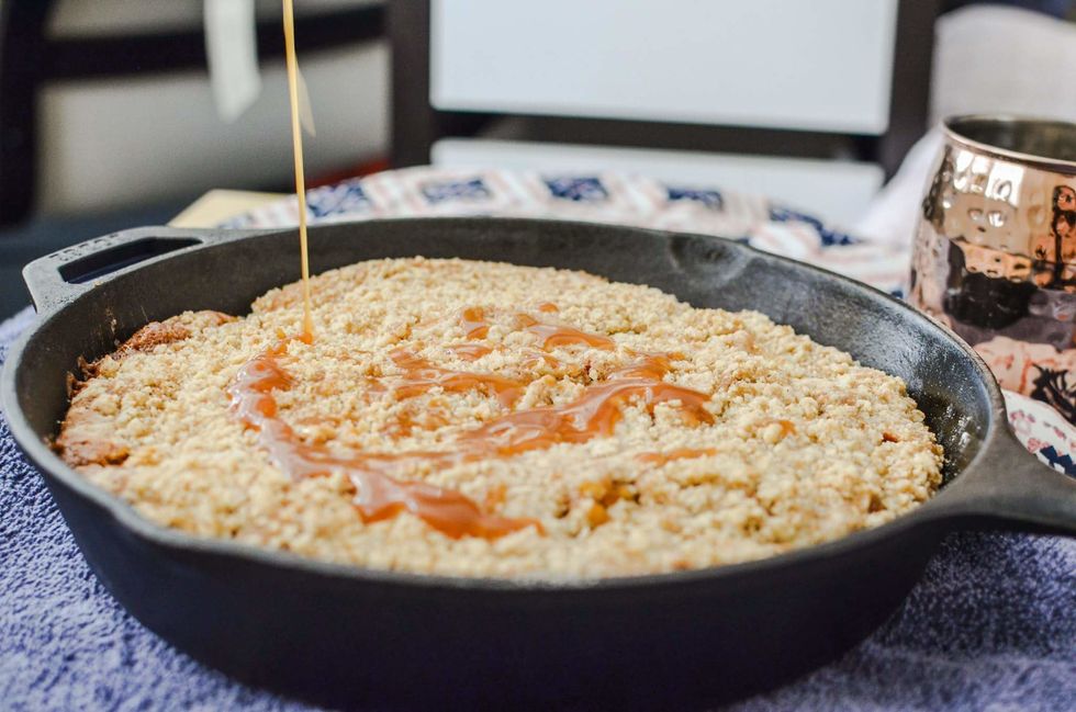 crumble with caramel sauce that is baked in a cast iron pan