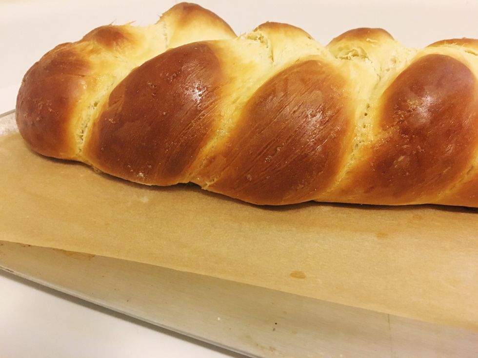 challah bread baked on parchment paper