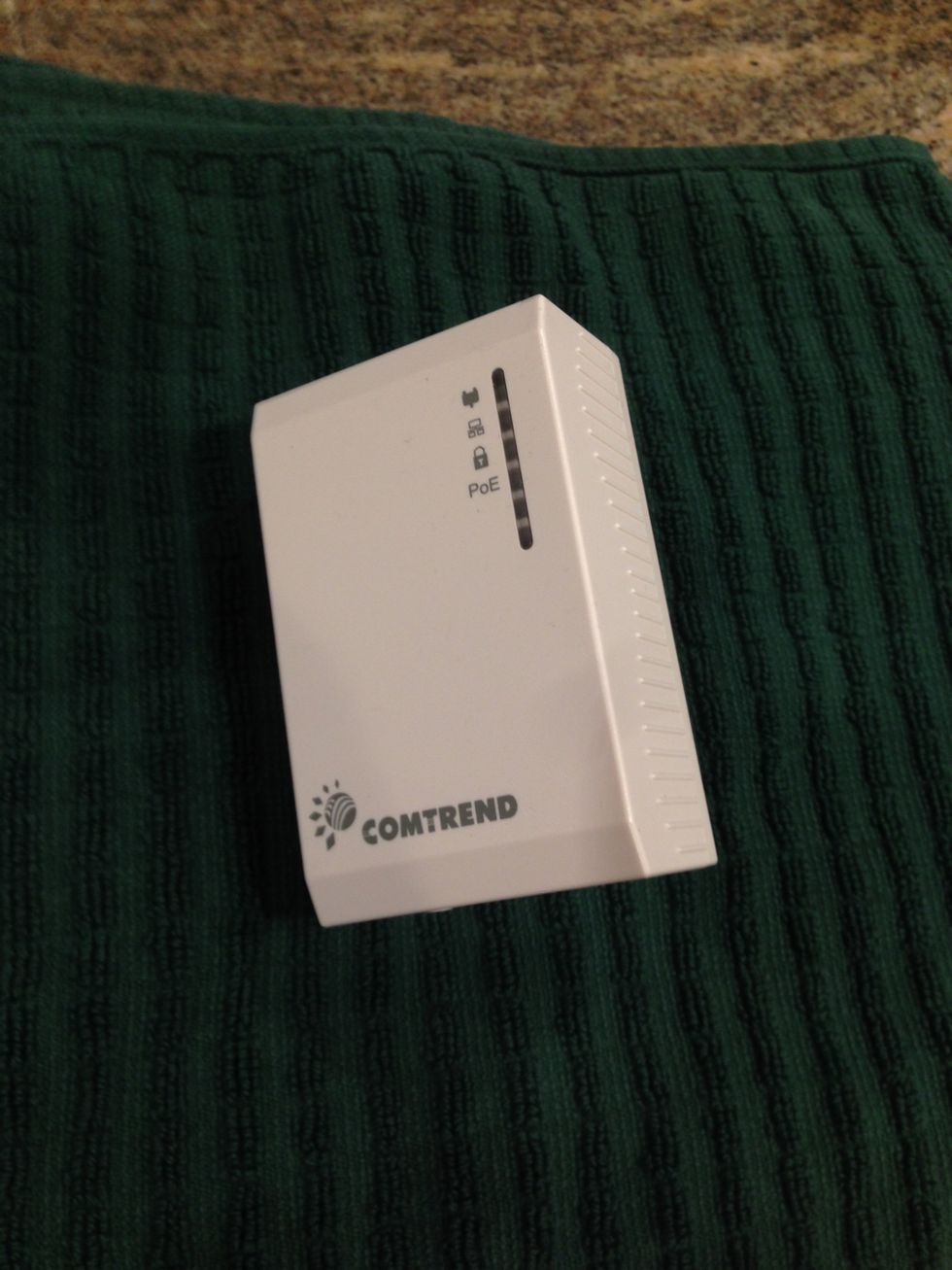 A photo of a Powerline Converter used by Vivint to power and connect their home security products.
