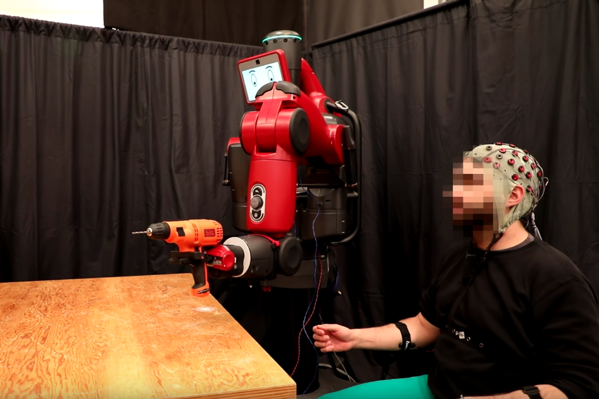 Watch how this robot is controlled by brain waves and hand gestures