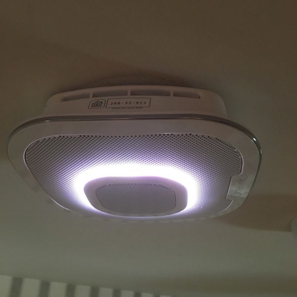 a photo of OneLink installed on a ceiling in a house.