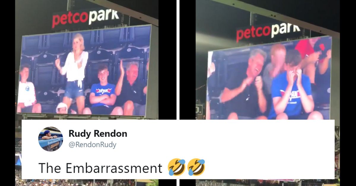 Teen Can't Hide His Embarrassment Over Dancing Adults Next To Him On The Jumbotron 😂