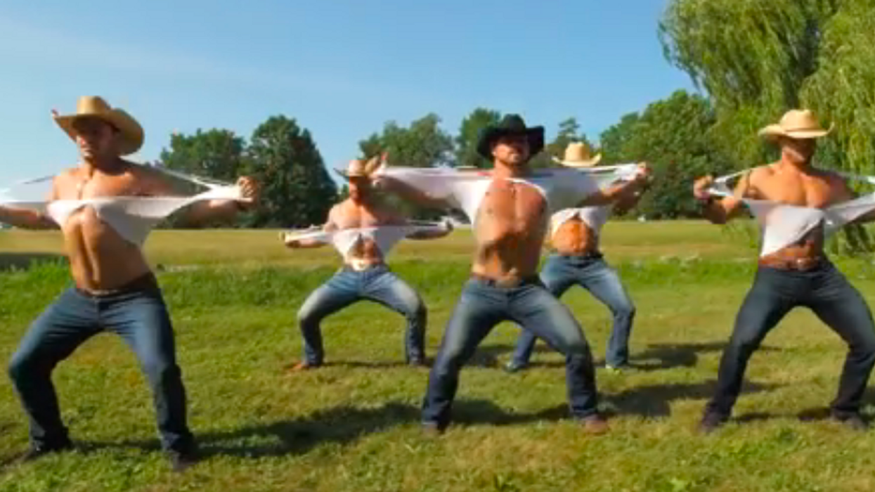 These cowboys are dancing in a field, in case your summer wasn't hot enough