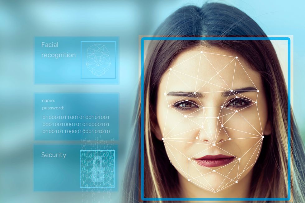 a woman's face being checked by facial recognition