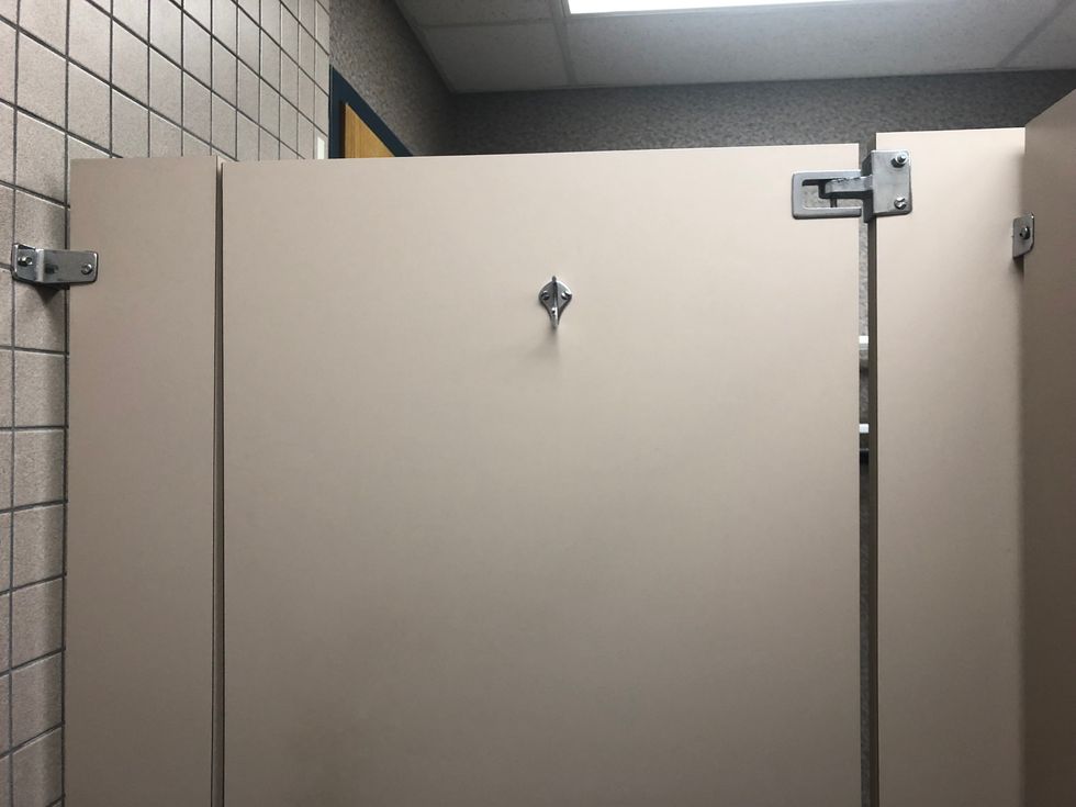 5 Ways To React To That Gaping Hole In Public Restroom Stalls